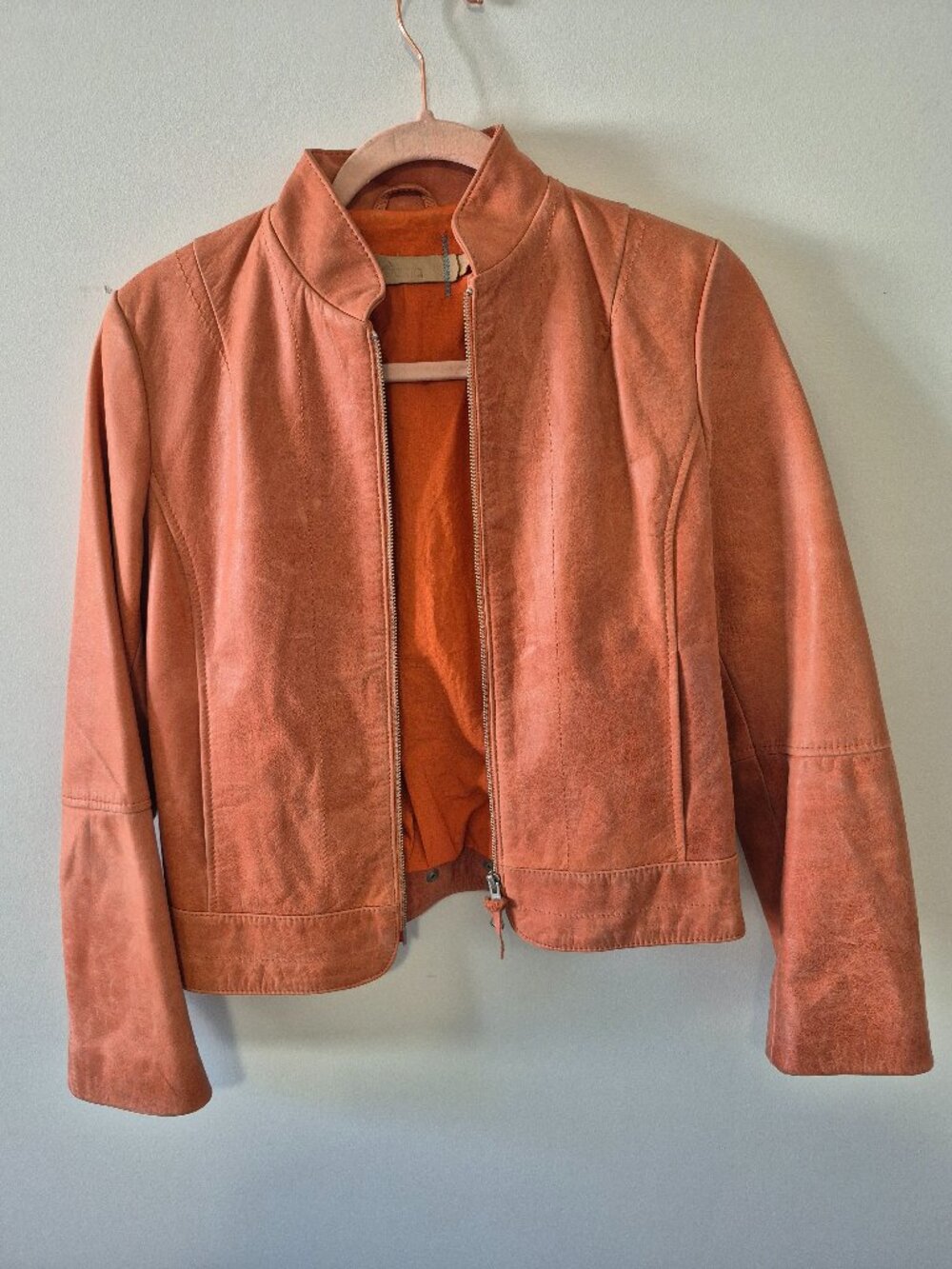 Doma mandarin orange leather jacket.